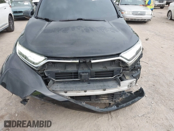2017 Honda CR-V Touring with VIN 2HKRW2H96HH672017, listed as a IAAI auction lot 42151118 with 144,527 mi miles and . Bid and sale history available at carsss.com. Image 6.