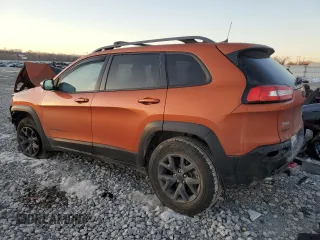 2016 Jeep Cherokee Trailhawk with VIN 1C4PJMBSXGW286822, listed as a Copart auction lot 42823545 with 66,898 mi miles and Salvage title. Bid and sale history available at DreamBid. Image 2.