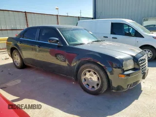2006 Chrysler 300 Touring z VIN 2C3KA53G96H360856, wystawiony jako Copart lot #57558675 z przebiegiem 254 051 mil mil oraz Czysty tytuł • Clean title. Historia ofert i sprzedaży dostępna na DreamBid. Obrazek 4.