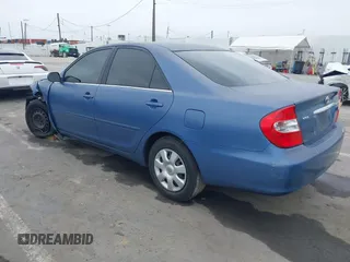 2004 Toyota Camry LE z VIN 4T1BE32K44U832767, wystawiony jako IAAI lot #42041228 z przebiegiem 185 778 mil mil oraz . Historia ofert i sprzedaży dostępna na DreamBid. Obrazek 3.
