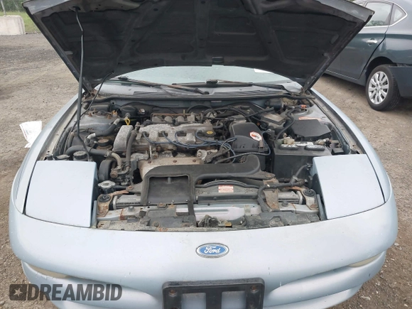 1995 Ford Probe z VIN 1ZVLT20A6S5154983, wystawiony jako IAAI lot #42301574 z przebiegiem 128 515 mil mil oraz . Historia ofert i sprzedaży dostępna na DreamBid. Obrazek 10.
