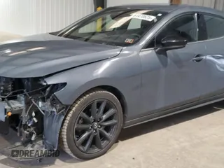 2021 Mazda 3 Premium Plus with VIN JM1BPBNYXM1311594, listed as a Copart auction lot 61470625 with 89,254 mi miles and Salvage title. Bid and sale history available at DreamBid. Image 1.