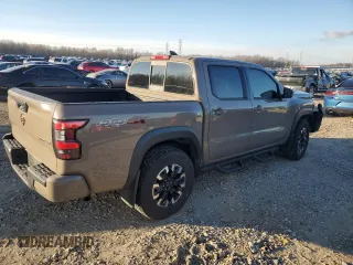 2022 Nissan Frontier Pro-4X z VIN 1N6ED1EK4NN611473, wystawiony jako Copart lot #89142785 z przebiegiem 24 871 mil mil oraz Szkody całkowita. Historia ofert i sprzedaży dostępna na DreamBid. Obrazek 3.