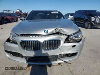 2014 BMW 7 Series 740Li with VIN WBAYE4C56ED138593, listed as a Copart auction lot 82010534 with 88,393 mi miles and Salvage Title. Bid and sale history available at carsss.com. Image 5.