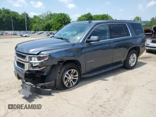 2020 Chevrolet Tahoe LT with VIN 1GNSKBKC0LR260766, listed as a Copart auction lot 61465725 with 104,850 mi miles and Salvage title. Bid and sale history available at DreamBid. Image 1.