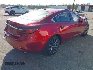2018 Mazda 6 Grand Touring with VIN JM1GL1TY1J1302146, listed as a IAAI auction lot 41788881 with 55,852 mi miles and . Bid and sale history available at DreamBid. Image 4.
