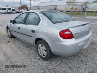 2005 Dodge Neon SE with VIN 1B3ES26C35D205066, listed as a IAAI auction lot 41943955 with 129,821 mi miles. Bid and sale history available at carsss.com. Image 3.