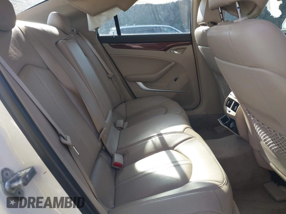 2010 Cadillac CTS Luxury with VIN 1G6DE5EG9A0118042, listed as a IAAI auction lot 42448076 with 142,359 mi miles and . Bid and sale history available at DreamBid. Image 8.