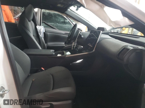 2024 Toyota bZ4X XLE with VIN JTMAAAAAXRA053617, listed as a Copart auction lot 44891775 with 94 mi miles and Salvage Title. Bid and sale history available at DreamBid. Image 7.