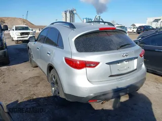 2015 Infiniti QX70 with VIN JN8CS1MW6FM482894, listed as a IAAI auction lot 41671236 with 106,599 mi miles and . Bid and sale history available at DreamBid. Image 3.