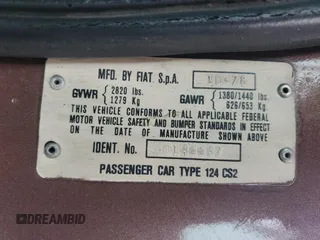 1979 FIAT 124 Spider z VIN 124CS20146682, wystawiony jako Copart lot #73923954 z przebiegiem 83 258 mil mil oraz Szkoda całkowita • Salvage title. Historia ofert i sprzedaży dostępna na DreamBid. Obrazek 12.