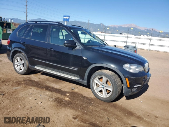 2012 BMW X5 35d with VIN 5UXZW0C57CL667663, listed as a Copart auction lot 63496695 with 116,218 mi miles and Clean title. Bid and sale history available at DreamBid. Image 4.