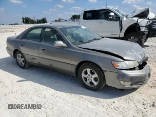 1998 Lexus ES 300 Luxury Sport Sdn with VIN JT8BF28G2W5046136, listed as a Copart auction lot 74364844 with 209,940 mi miles and Salvage Title. Bid and sale history available at carsss.com. Image 4.