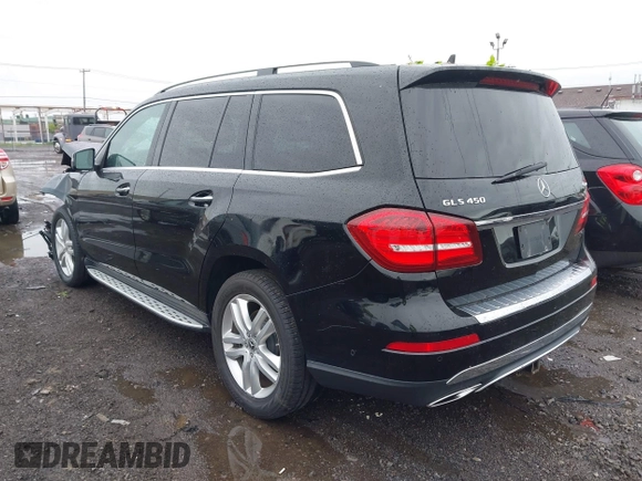 2017 Mercedes-Benz GLS 450 with VIN 4JGDF6EE8HA972826, listed as a IAAI auction lot 42302141 with 112,535 mi miles and . Bid and sale history available at DreamBid. Image 3.
