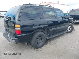 2005 Chevrolet Tahoe Z71 with VIN 1GNEC13TX5R145310, listed as a IAAI auction lot 42056793 with 159,002 mi miles and . Bid and sale history available at DreamBid. Image 4.