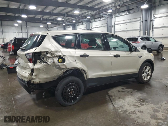 2017 Ford Escape S with VIN 1FMCU0F79HUC26012, listed as a Copart auction lot 65235285 with 98,682 mi miles and Salvage title. Bid and sale history available at DreamBid. Image 3.