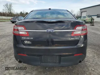 2014 Ford Taurus Limited z VIN 1FAHP2F85EG151167, wystawiony jako Copart lot #54376275 z przebiegiem 136 612 mil mil oraz Szkody całkowita. Historia ofert i sprzedaży dostępna na DreamBid. Obrazek 6.