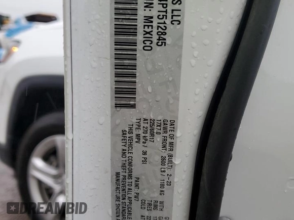 2023 Jeep Compass Latitude with VIN 3C4NJDBN4PT512845, listed as a Copart auction lot 55153135 with 52,410 mi miles and Salvage title. Bid and sale history available at DreamBid. Image 13.