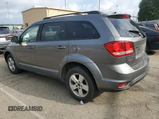 2012 Dodge Journey SXT with VIN 3C4PDCBGXCT331433, listed as a Copart auction lot 63907815 with 176,505 mi miles and Clean title. Bid and sale history available at DreamBid. Image 2.