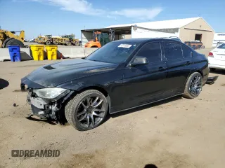 2014 BMW 3 Series 335i xDrive with VIN WBA3B9C56EF588572, listed as a Copart auction lot 52018665 with 175,777 mi miles and Clean title. Bid and sale history available at DreamBid. Image 1.