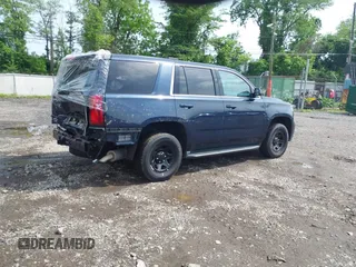 2019 Chevrolet Tahoe Commercial z VIN 1GNLCDEC1KR218436, wystawiony jako IAAI lot #42286365 z przebiegiem 119 981 mil mil oraz . Historia ofert i sprzedaży dostępna na DreamBid. Obrazek 4.