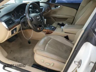 2012 Audi A7 Prestige с VIN WAU2GAFC4CN056443, выставлен на аукционе Copart как лот 60077495 с пробегом 182 818 миль миль и Списание • Salvage title. История ставок и продаж доступна на DreamBid. Изображение 7.