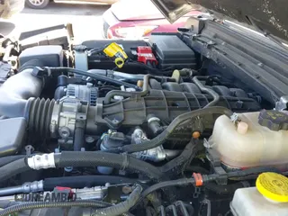 2022 Jeep Wrangler Unlimited Sport S z VIN 1C4HJXDG1NW200793, wystawiony jako IAAI lot #41810817 z przebiegiem 35 212 mil mil oraz . Historia ofert i sprzedaży dostępna na DreamBid. Obrazek 21.