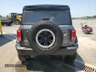 2023 Ford Bronco с VIN 1FMEE5DH2PLB21489, выставлен на аукционе Copart как лот 60690365 с пробегом 14 326 миль миль и Списание • Salvage title. История ставок и продаж доступна на DreamBid. Изображение 6.