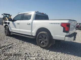 2023 Ford F-150 Lightning Pro z VIN 1FT6W1EV3PWG34249, wystawiony jako Copart lot #46901535 z przebiegiem 9 389 mil mil oraz Szkoda całkowita • Salvage title. Historia ofert i sprzedaży dostępna na DreamBid. Obrazek 2.