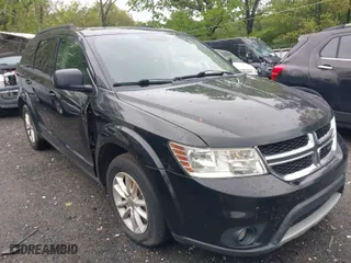 2016 Dodge Journey SXT with VIN 3C4PDCBG2GT100550, listed as a IAAI auction lot 41982670 with 184,601 mi miles. Bid and sale history available at carsss.com. Image 1.