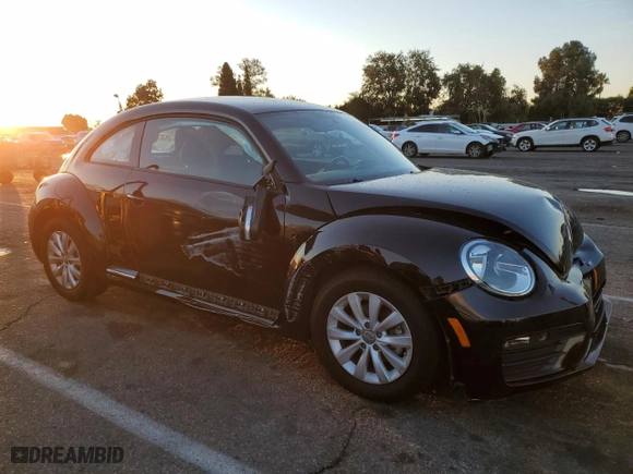 2019 Volkswagen Beetle S with VIN 3VWFD7AT3KM710863, listed as a Copart auction lot 79176004 with 0 mi miles and Salvage Title. Bid and sale history available at carsss.com. Image 4.