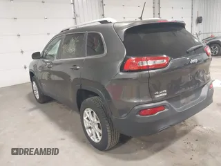 2014 Jeep Cherokee Altitude with VIN 1C4PJMCB2EW317346, listed as a IAAI auction lot 41861651 with 100,602 mi miles. Bid and sale history available at carsss.com. Image 3.