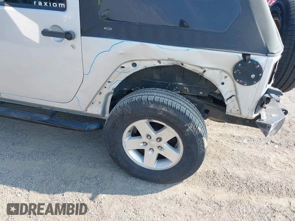 2012 Jeep Wrangler Sport z VIN 1C4AJWAG9CL255278, wystawiony jako IAAI lot #42469091 z przebiegiem 140 480 mil mil oraz . Historia ofert i sprzedaży dostępna na DreamBid. Obrazek 6.