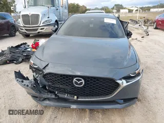 2022 Mazda 3 Carbon Edition z VIN JM1BPACL2N1509492, wystawiony jako IAAI lot #41198183 z przebiegiem Nie podano mil oraz . Historia ofert i sprzedaży dostępna na DreamBid. Obrazek 11.