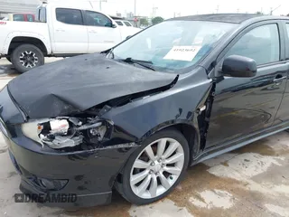 2009 Mitsubishi Lancer with VIN JA3AU86W29U039924, listed as a IAAI auction lot 41923692 with 183,591 mi miles and . Bid and sale history available at DreamBid. Image 6.