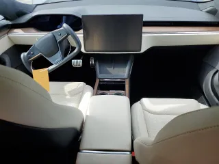 2022 Tesla Model S with VIN 5YJSA1E5XNF471212, listed as a Copart auction lot 57384025 with Not provided miles and Salvage title. Bid and sale history available at DreamBid. Image 8.