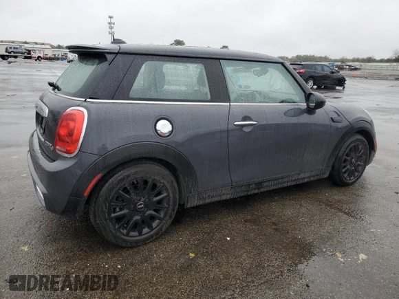 2014 MINI Hardtop S with VIN WMWXM7C54ET985344, listed as a Copart auction lot 52012465 with 87,017 mi miles and Salvage title. Bid and sale history available at DreamBid. Image 3.