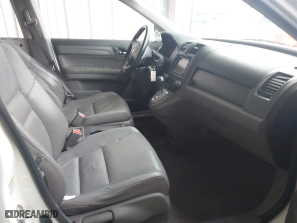 2009 Honda CR-V EX-L with VIN JHLRE387X9C003580, listed as a IAAI auction lot 41945794 with 131,061 mi miles. Bid and sale history available at carsss.com. Image 5.