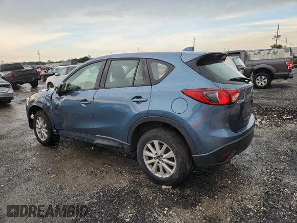 2015 Mazda CX-5 Sport with VIN JM3KE2BE3F0488309, listed as a Copart auction lot 63688835 with 121,775 mi miles and Clean title. Bid and sale history available at DreamBid. Image 2.