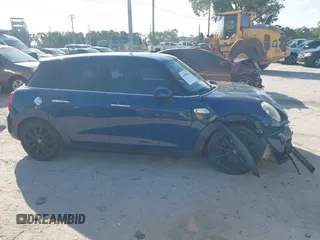 2016 MINI Cooper Hardtop 4 Door S with VIN WMWXU3C54G2D30766, listed as a IAAI auction lot 42008026 with 101,898 mi miles. Bid and sale history available at carsss.com. Image 13.