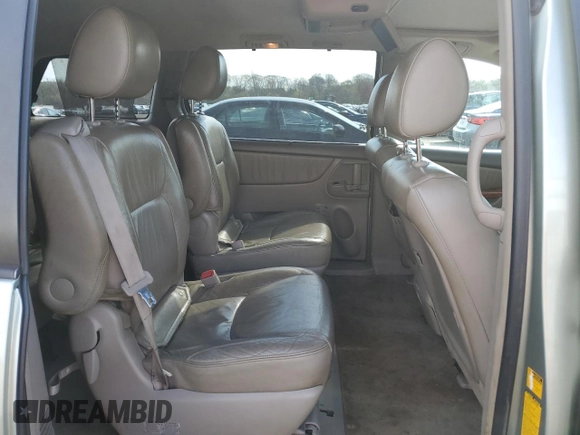 2010 Toyota Sienna XLE z VIN 5TDDK4CC9AS032923, wystawiony jako Copart lot #54231845 z przebiegiem 136 860 mil mil oraz Szkoda całkowita • Salvage title. Historia ofert i sprzedaży dostępna na DreamBid. Obrazek 11.