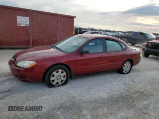 2002 Ford Taurus LX with VIN 1FAFP52U92A143857, listed as a Copart auction lot 77967554 with 120,097 mi miles and Salvage Title. Bid and sale history available at carsss.com. Image 1.