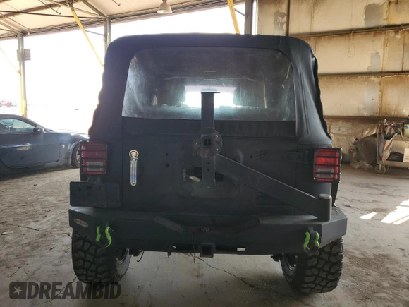 2014 Jeep Wrangler Unlimited Sport with VIN 1C4HJWDG0EL190155, listed as a Copart auction lot 51941045 with 121,215 mi miles and Clean Title. Bid and sale history available at carsss.com. Image 6.