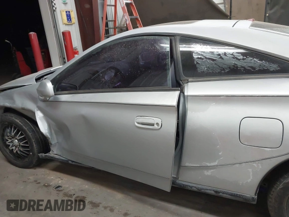 2004 Toyota Celica GT z VIN JTDDR32TX40167973, wystawiony jako IAAI lot #41458284 z przebiegiem 203 384 mil mil oraz . Historia ofert i sprzedaży dostępna na DreamBid. Obrazek 13.