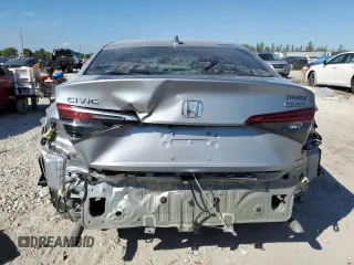 2024 Honda Civic Sedan Touring with VIN 2HGFE1F91RH328206, listed as a Copart auction lot 46074185 with 6,946 mi miles and Salvage Title. Bid and sale history available at carsss.com. Image 6.