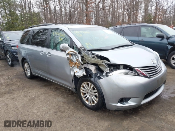 2014 Toyota Sienna XLE with VIN 5TDYK3DC5ES461184, listed as a IAAI auction lot 41447642 with 122,539 mi miles. Bid and sale history available at carsss.com. Image 1.
