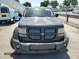2011 Dodge Nitro Heat with VIN 1D4PU4GK7BW546475, listed as a Copart auction lot 57531065 with 157,935 mi miles and Salvage title. Bid and sale history available at DreamBid. Image 5.