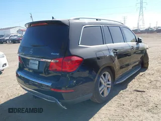 2014 Mercedes-Benz GL 450 with VIN 4JGDF7CE1EA404163, listed as a IAAI auction lot 40596433 with Not provided miles and . Bid and sale history available at DreamBid. Image 4.