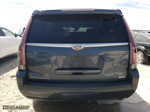 2020 Cadillac Escalade Luxury with VIN 1GYS3BKJ7LR178967, listed as a Copart auction lot 48310755 with 94,579 mi miles and Salvage Title. Bid and sale history available at carsss.com. Image 6.