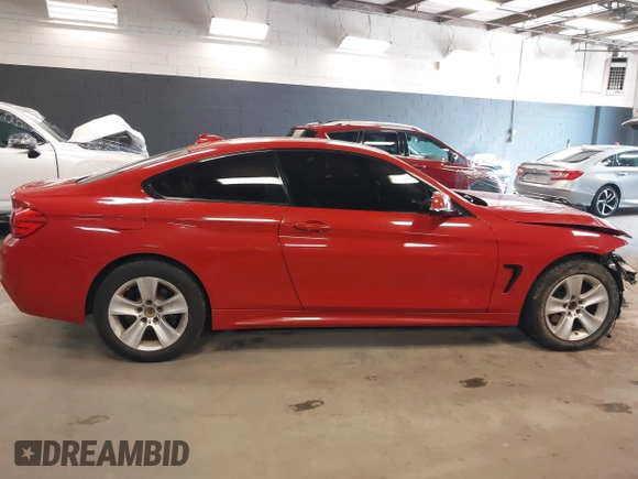 2015 BMW 4 Series 428i xDrive with VIN WBA3N5C50FK197930, listed as a IAAI auction lot 42063189 with 90,206 mi miles and . Bid and sale history available at DreamBid. Image 14.
